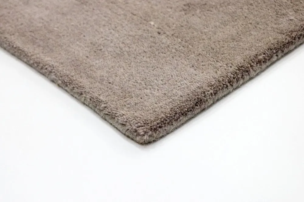 Designerski dywan - 242 x 153 cm - brązowy