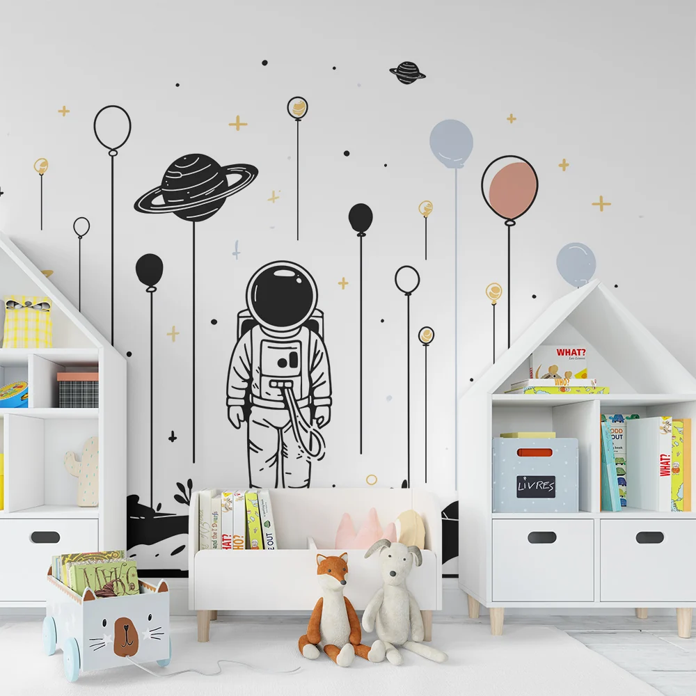 Tapety dla dzieci | Astronauta i kolorowe planety w kosmosie